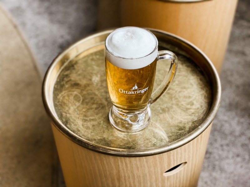 Beer glass on a table in Hotel Schani Wien