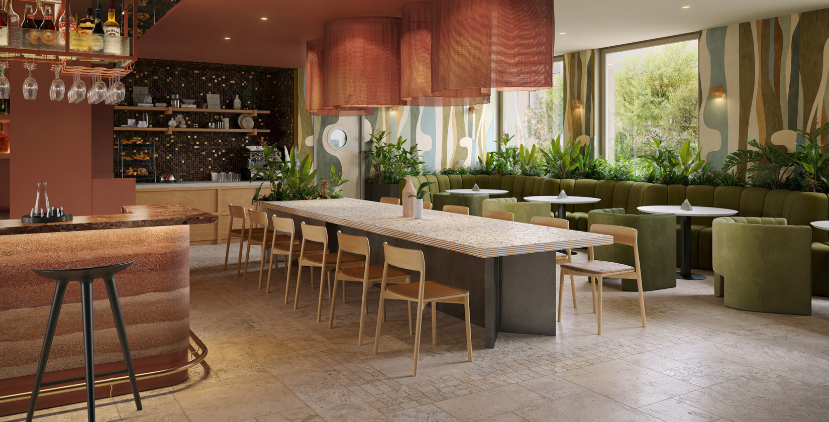 Langer Familientisch und gemütliche Sitzecken an der Bar im Hotel Schani City