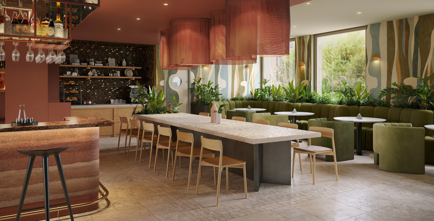 Ein langer Tisch und gemütliche Sitzecken im Restaurant des neuen Hotel Schani City