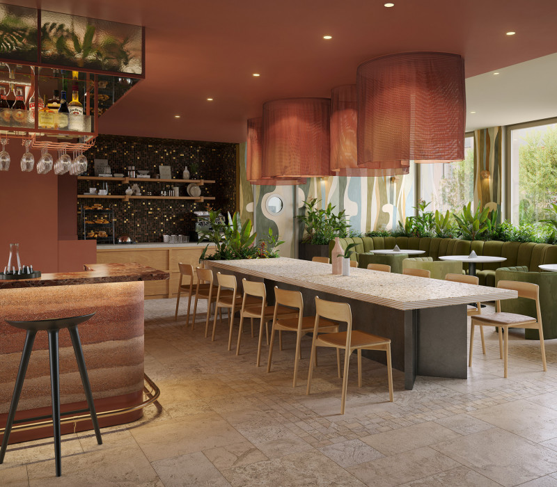 Langer Familientisch und gemütliche Sitzecken an der Bar im Hotel Schani City