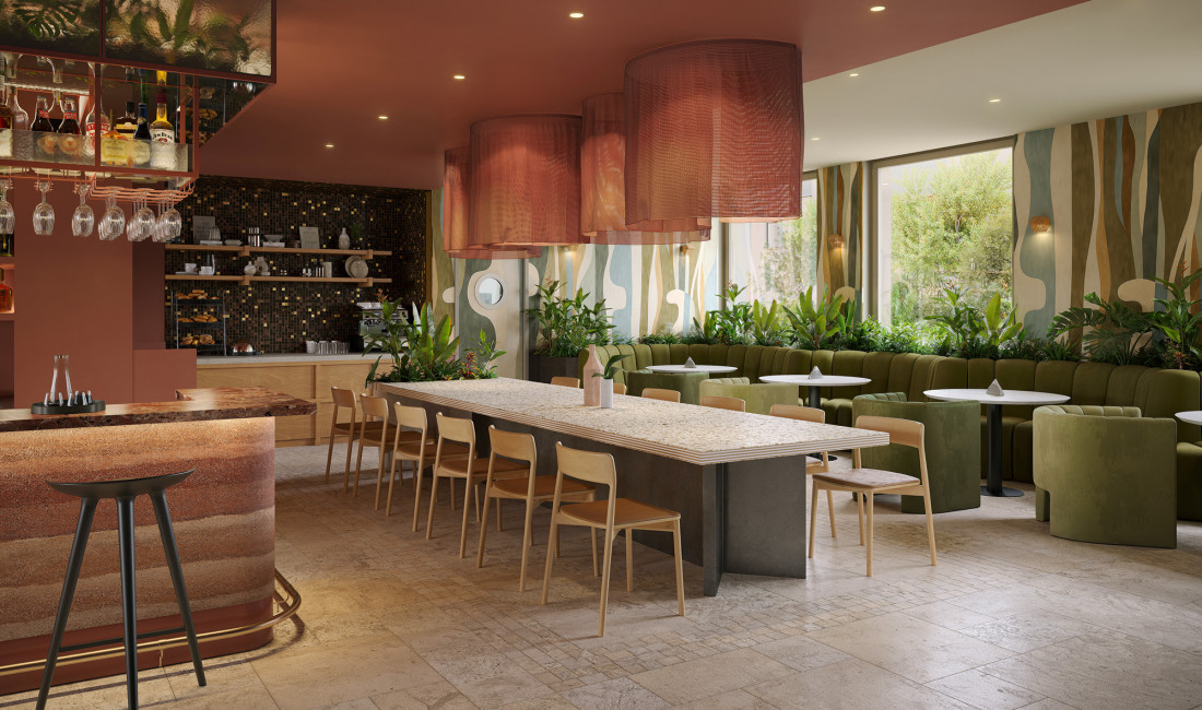 Langer Tisch, Bartheke und gemütliche Sitzmöglichkeiten in der Bar des Hotel Schani City