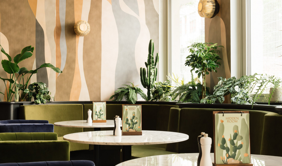 Seating area in the Hidden Room Bar & Kitchen at Hotel Schani City