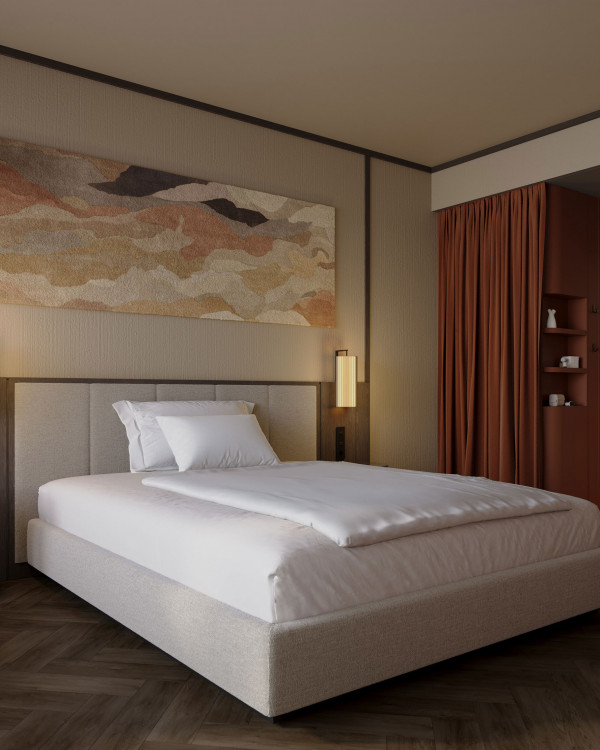 Französisches Doppelbett neben einem offenen Badezimmer in einem Einzelzimmer im Hotel Schani City