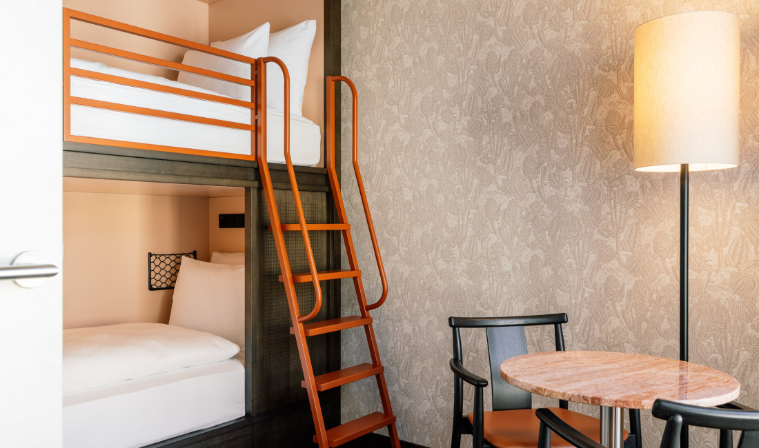 Bunk beds in a family room at Hotel Schani City
