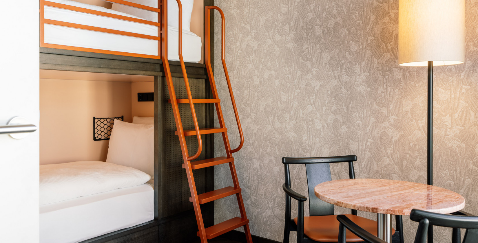 Bunk beds in a family room at Hotel Schani City 