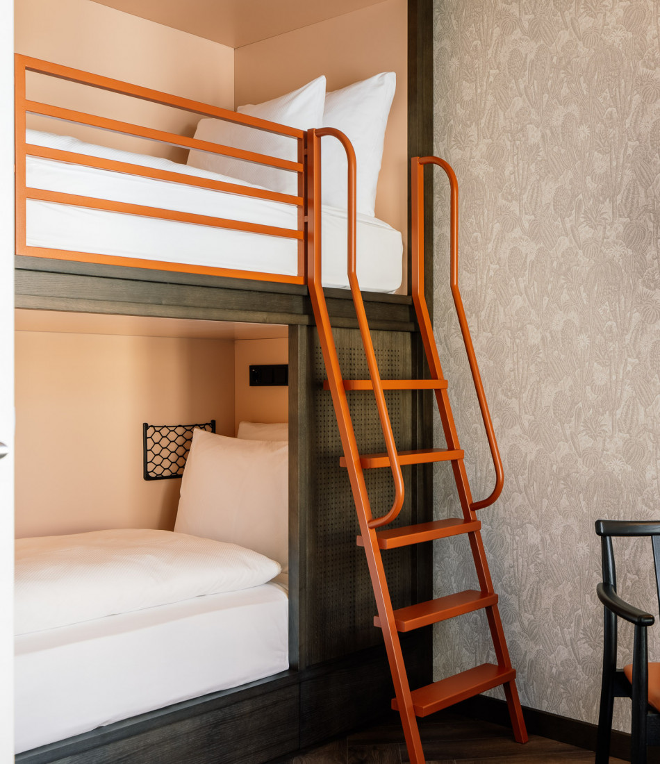Bunk beds in a family room at Hotel Schani City 