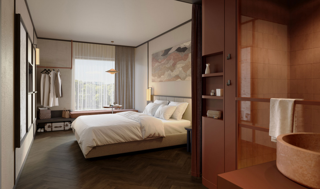 Doppelbett, Fensterbank und offener Schrank in einem hellen Doppelzimmer im Hotel Schani City