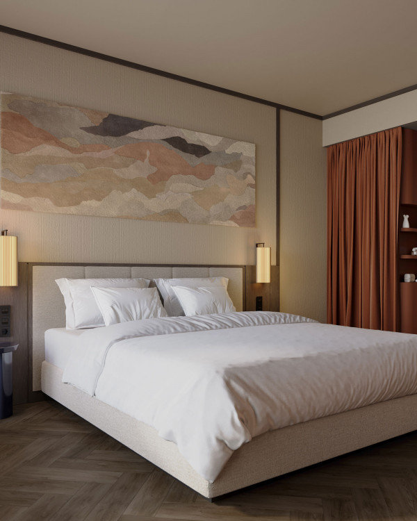 Doppelbett und offenes Bad mit Regendusche in einem Zimmer im Hotel Schani City 