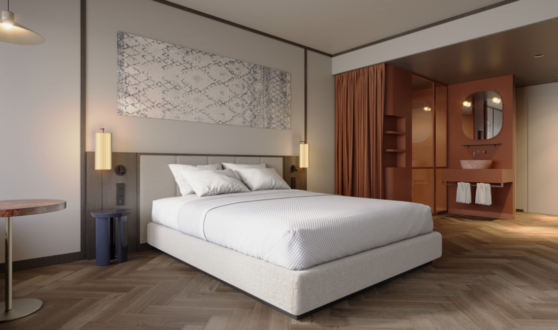 Doppelbett und offenes Badezimmer in einem Zimmer im neuen Hotel Schani City