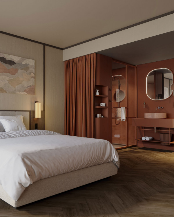 Doppelbett und offenes Bad mit Regendusche in einem Zimmer im Hotel Schani City 