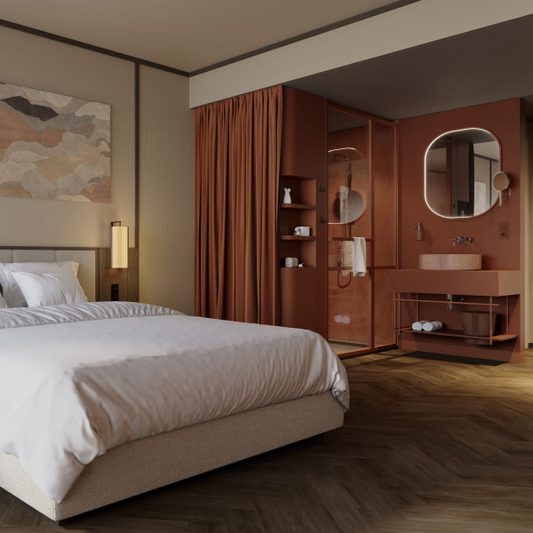 Doppelbett und offenes Bad mit Regendusche in einem Zimmer im Hotel Schani City 