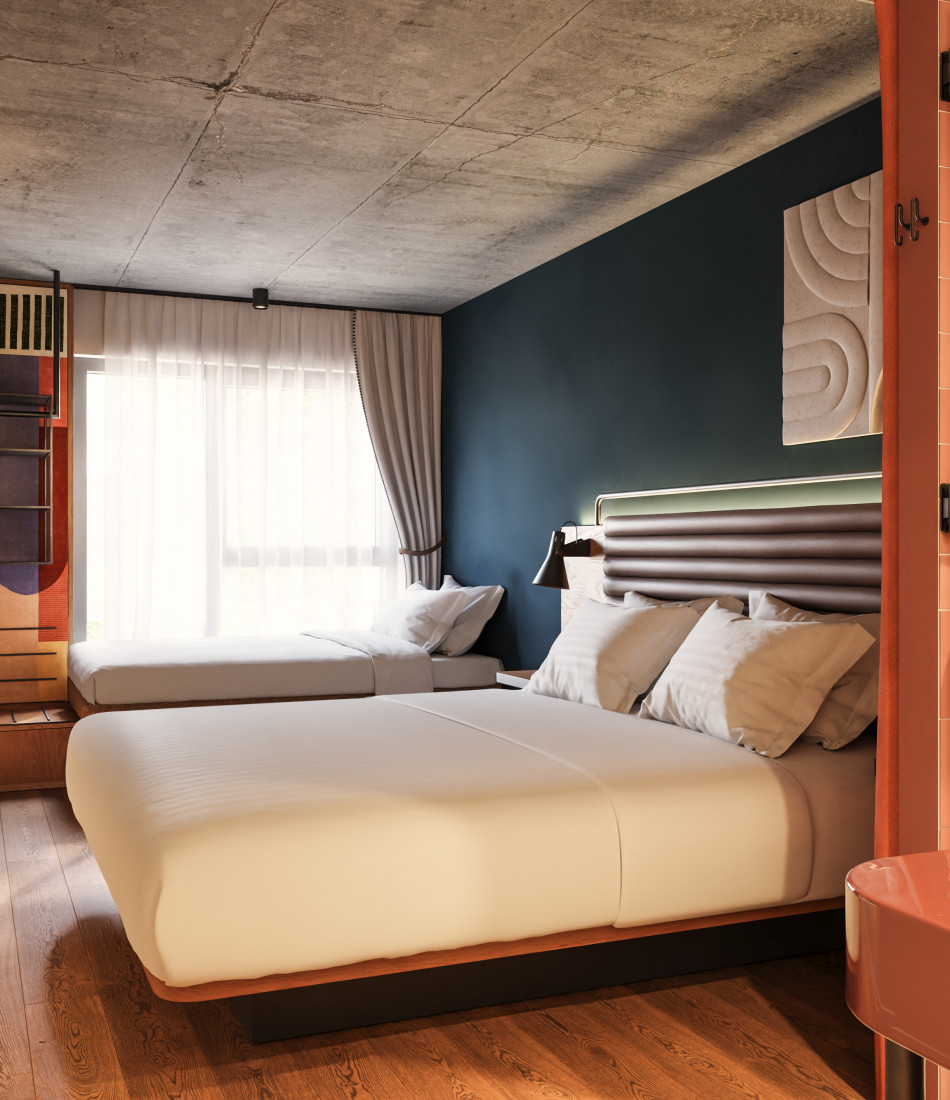 Doppelbett und Einzelbett in einem Zimmer im Hotel Schani Naschmarkt