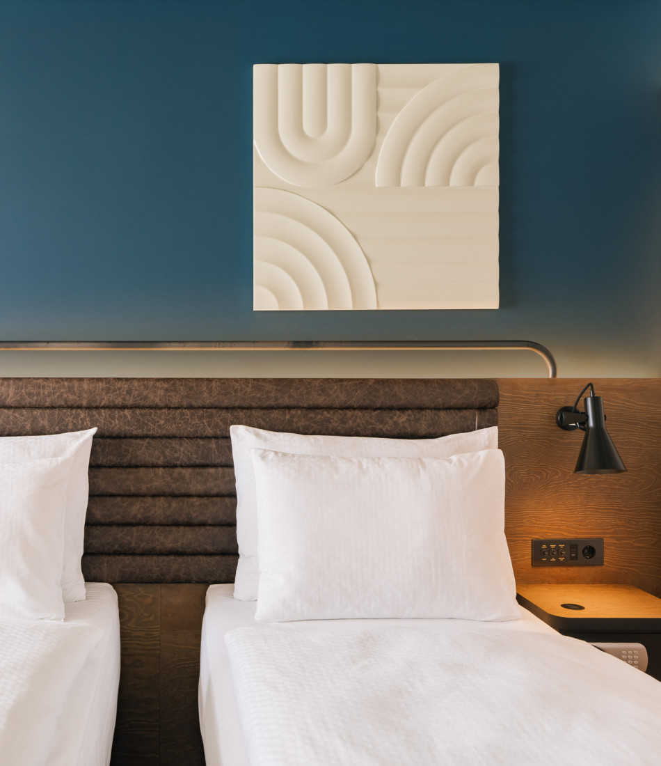 Zwei Twin Betten in einem Zimmer im Hotel Schani Naschmarkt