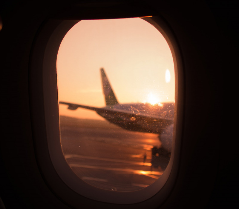 View from the airplane window at sunset