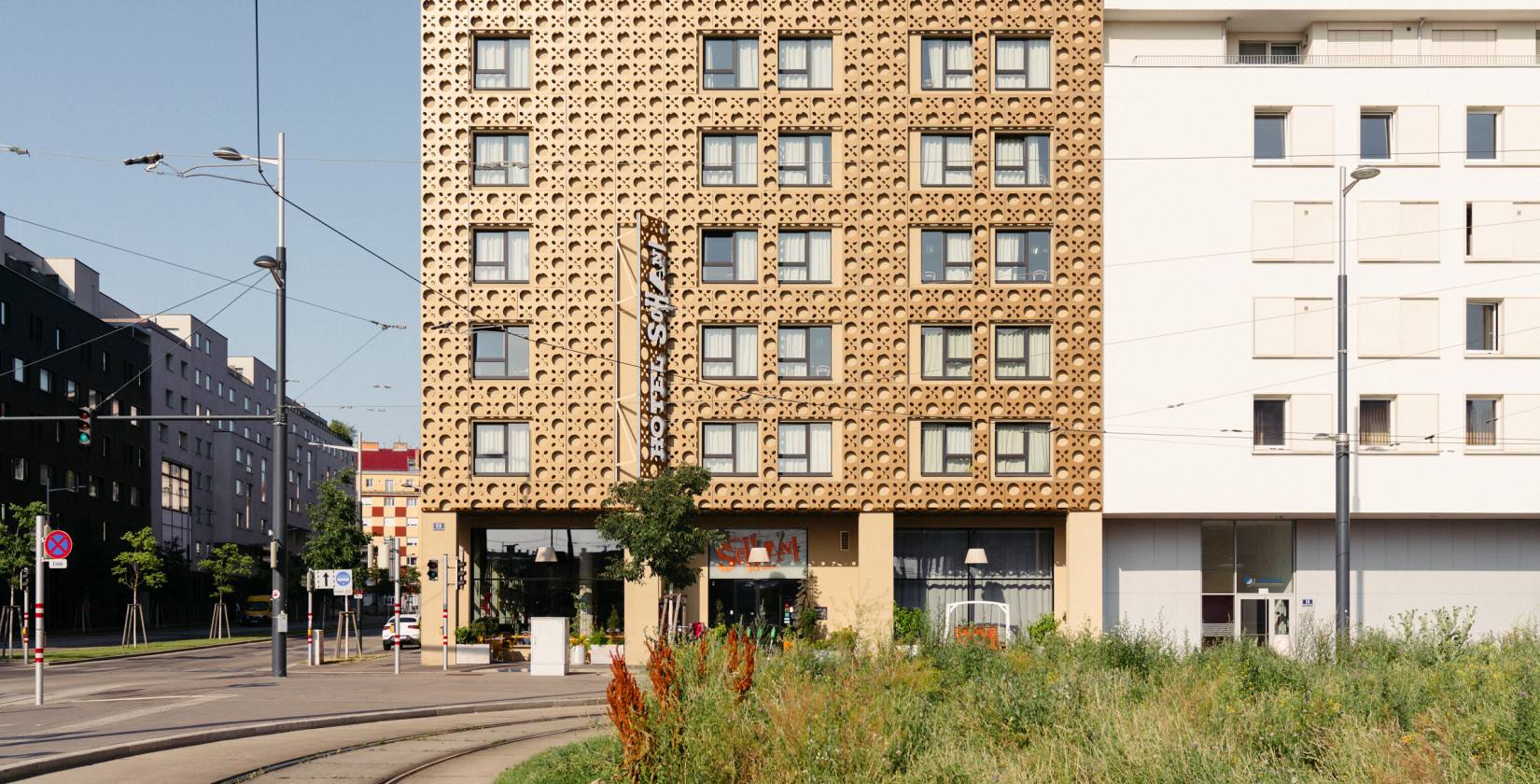 Exterior view of the Hotel Schani Wien with the façade inspired by the Viennese meshwork