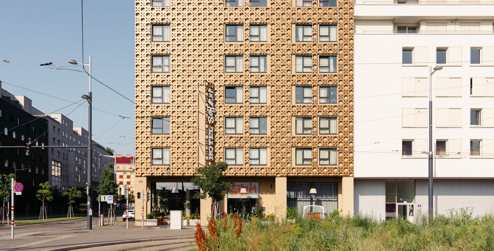 Exterior view of the Hotel Schani Wien with the façade inspired by the Viennese meshwork