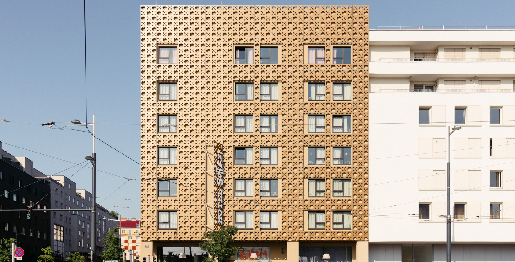 Exterior view of the Hotel Schani Wien with the façade inspired by the Viennese meshwork