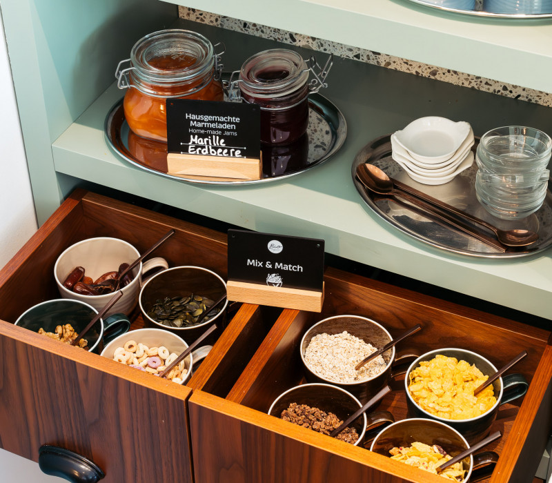 Home-made jam and cereal selection at the breakfast buffet in the Bio-Hotel Schani Wienblick