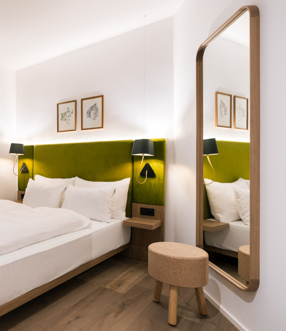 Doppelbett im Smart Economy Zimmer im Umwelthotel Wien