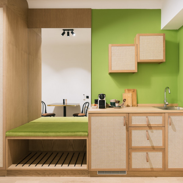 Kitchenette in green in a Smart Double Room at our bio hotel in Vienna