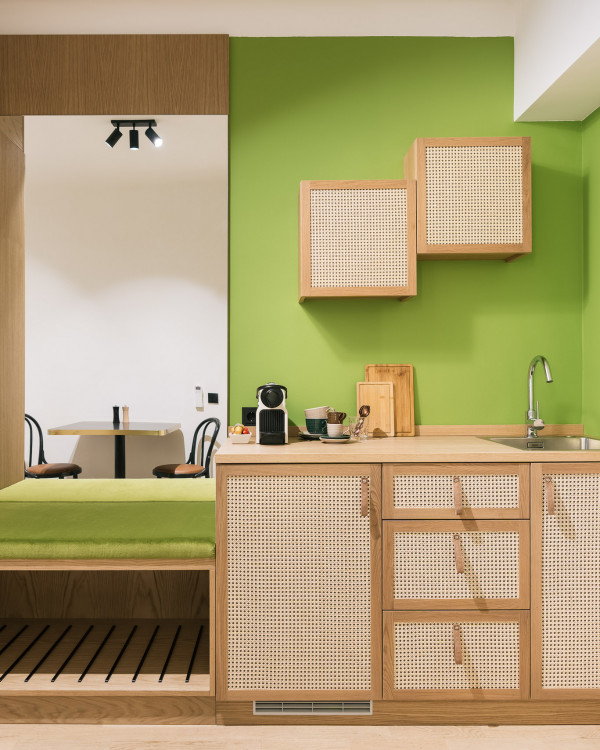 Kitchenette in green in a Smart Double Room at our bio hotel in Vienna