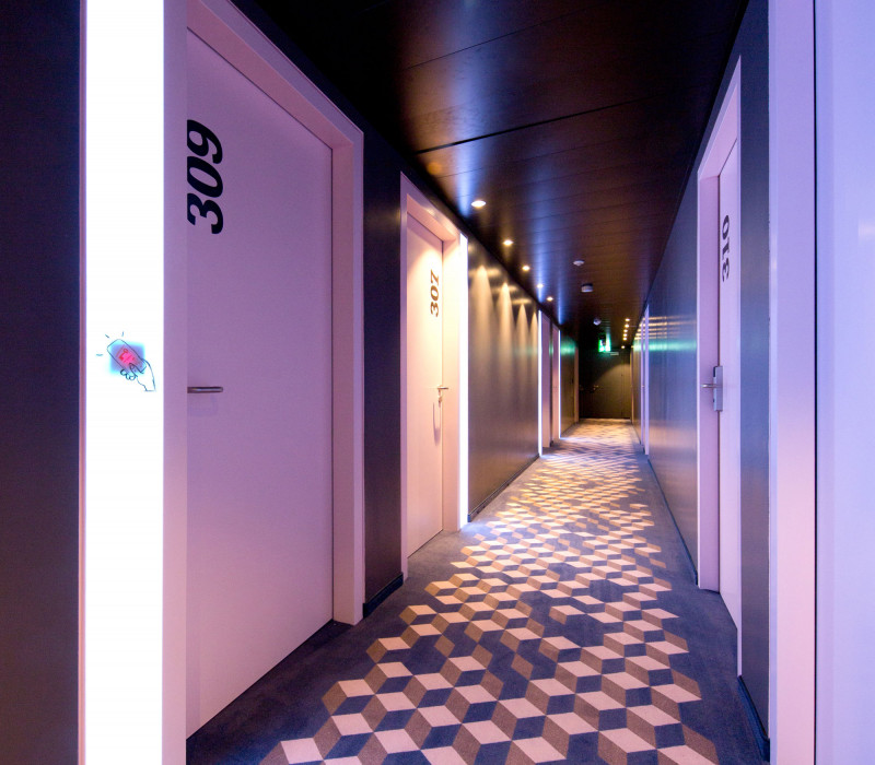 Hotel hallway with room doors in hotel Schani Wien