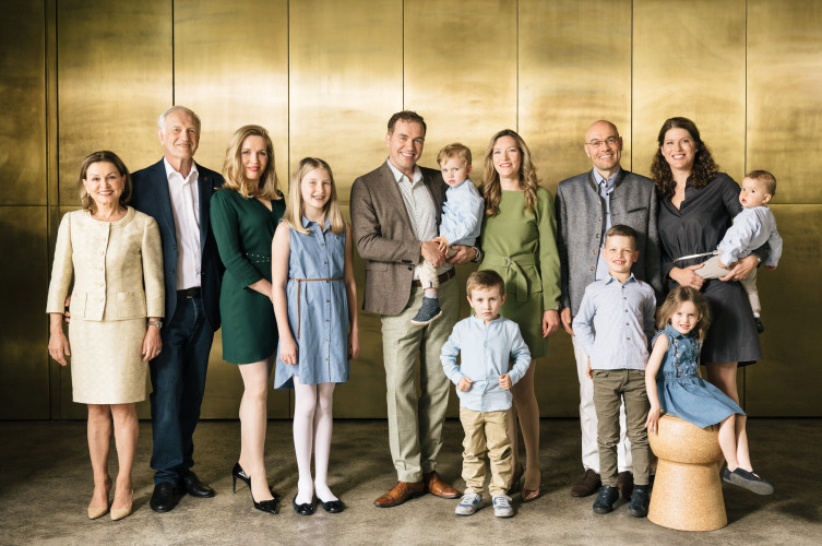 Host family Komarek sitting in the lobby of the Hotel Schani Wien