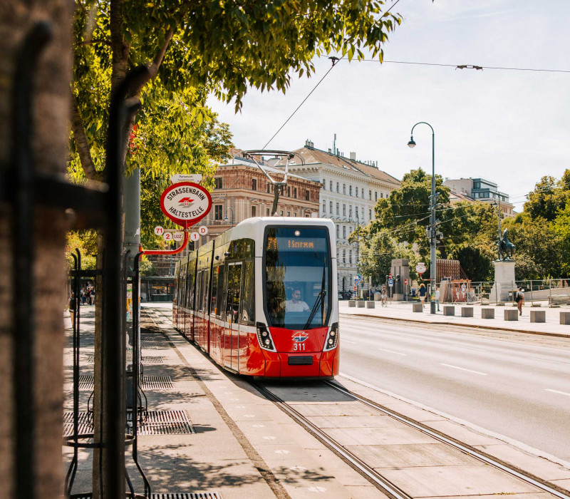 A tram driving through Vienna